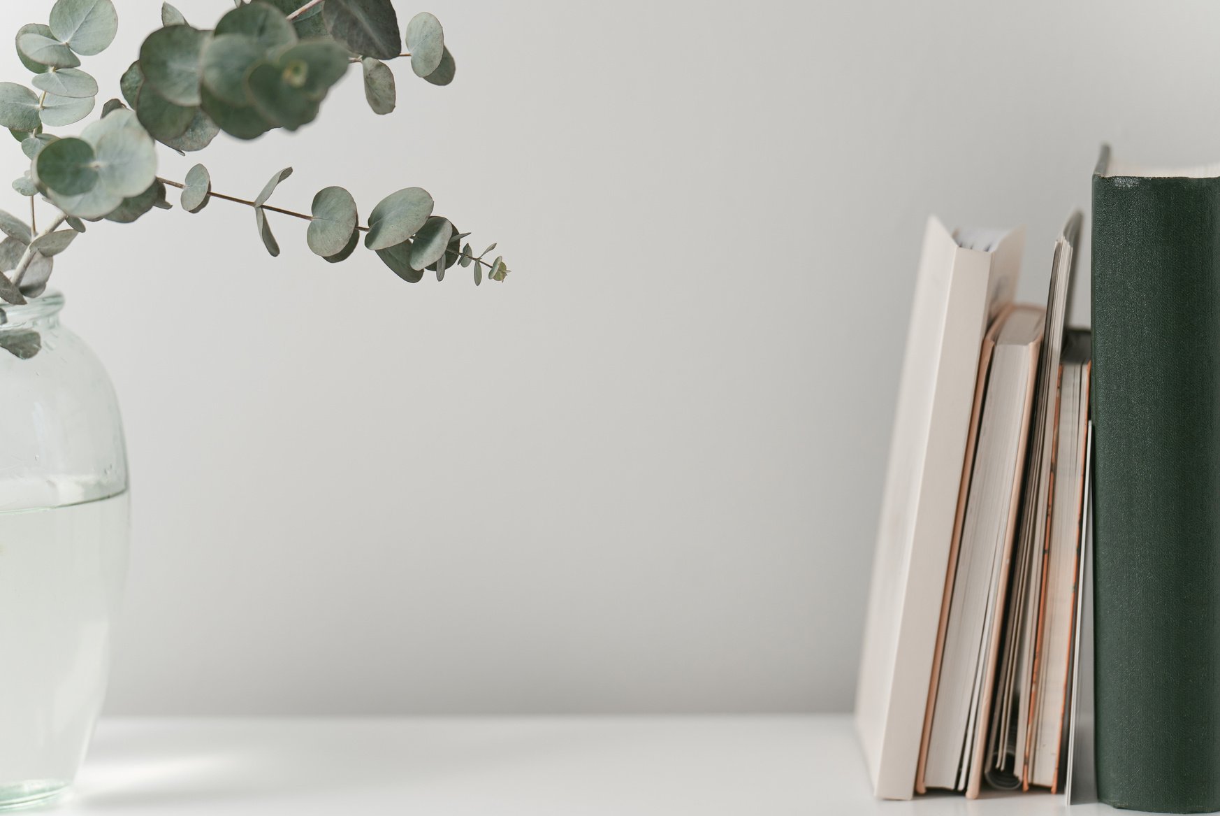 Minimal desk top with books and notebooks, aesthetic office